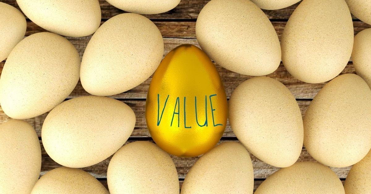 Eggs with a golden egg in the center with the word value written on it.